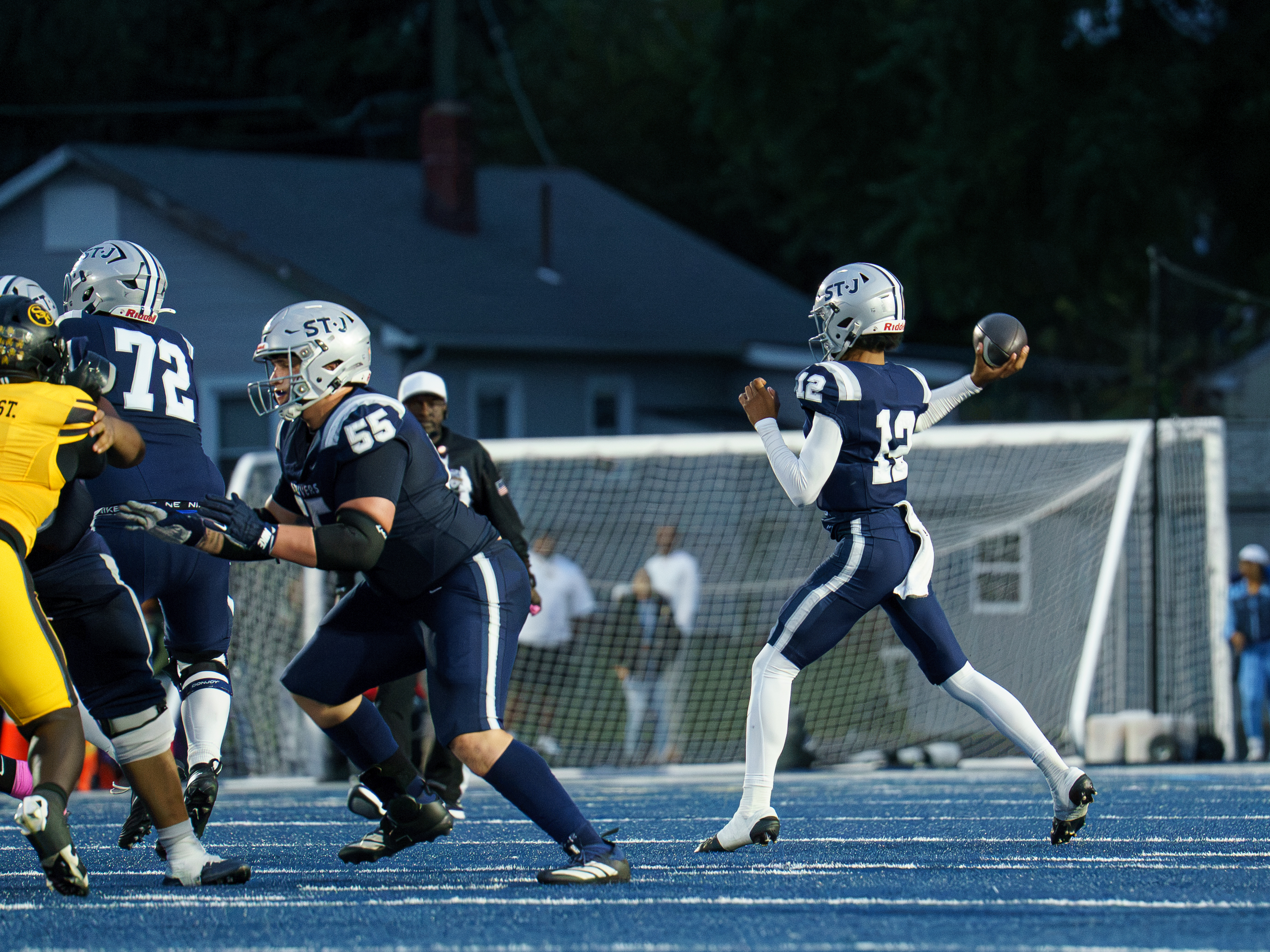 A St. James player prepares to throw a football during the game against St. Frances.